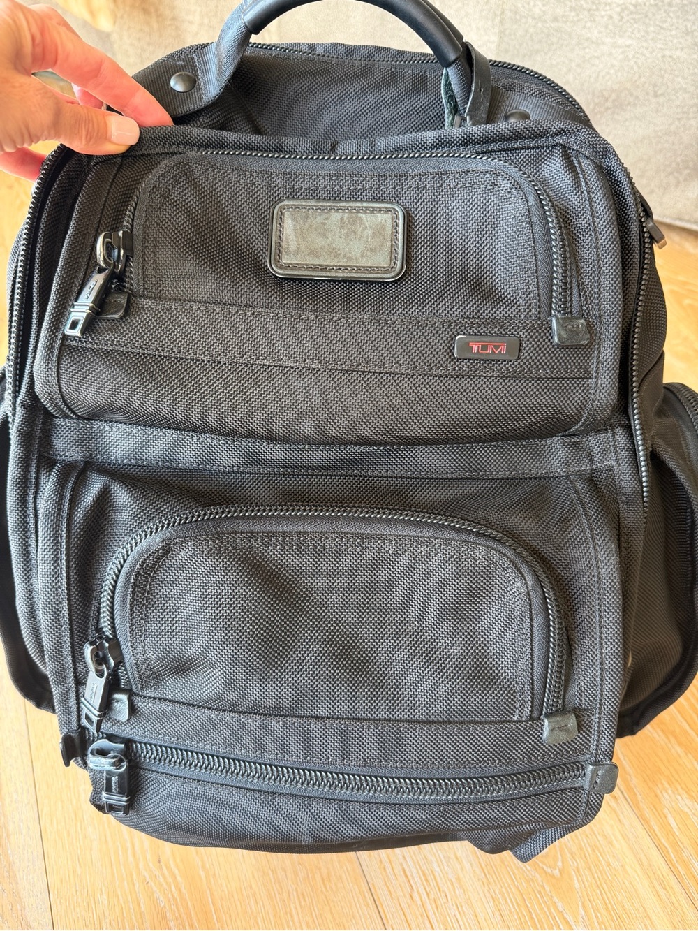 TUMI Black T-pass Nylon Men's Travel Backpack with Multiple Front Pockets